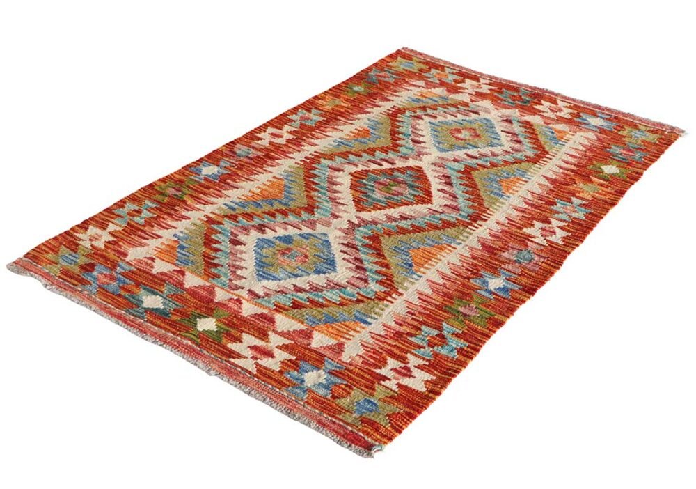 Kilim turco artesanal de 79x129 cm tejido a mano en lana. Diseño tradicional con colores vibrantes. Exclusivo en El Rincón de Fehmi.