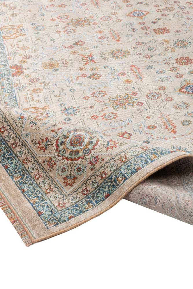 Alfombra oriental moderna IC404 en tonos crema, azul turquesa y terracota con motivos florales y cenefa decorativa