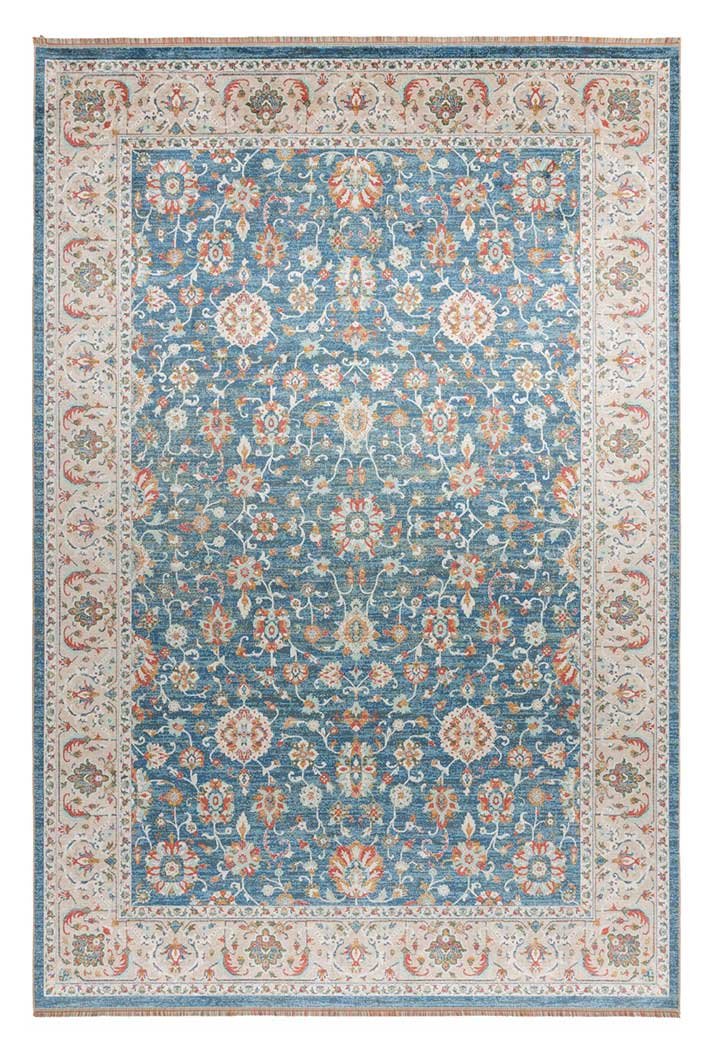 Alfombra oriental azul con motivos florales multicolor y cenefa decorativa en tonos crema